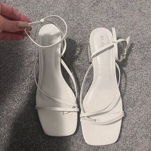 ALDO white block heels.
